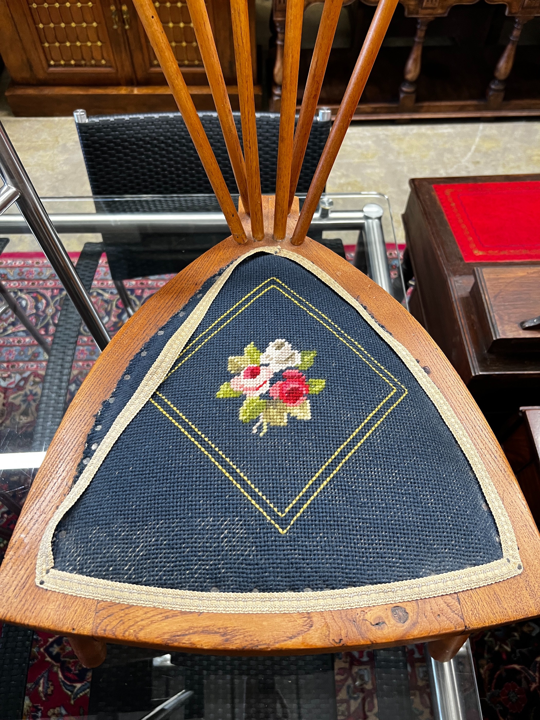 A late Victorian mahogany tapestry seat elbow chair, width 49cm, height 83cm together with a later oak side chair with triangular seat